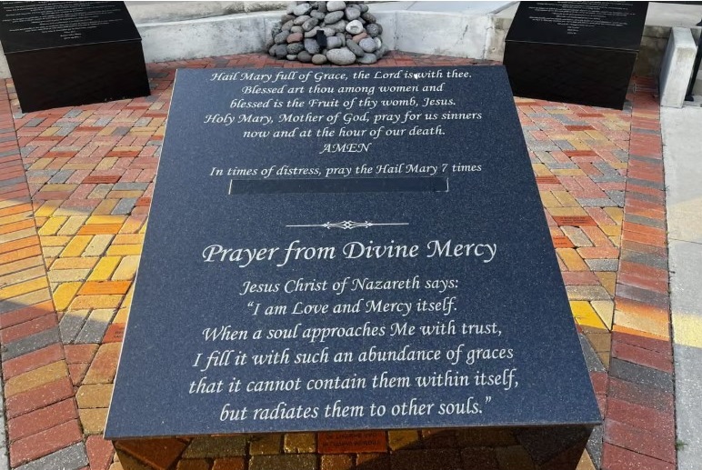 Black tape covers Anthony Odiong’s name on a prayer inscription outside a chapel he helped build in Luling, Louisiana, in his role as a Roman Catholic priest. Photograph: Ramon Antonio Vargas